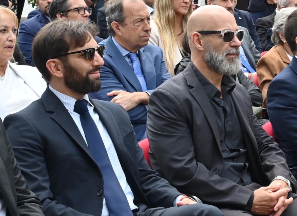 Papini y Rodríguez, compañeros de equipo.