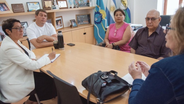Biss, Olivera y Sauter en la reunión en Rawson.