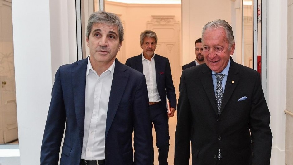 "Toto" Caputo y Funes de Rioja, de la UIA.