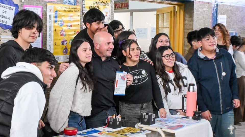 Sastre con alumnos.