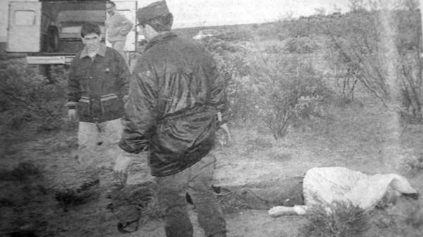 Muracioli muerto y personal policial en el lugar.