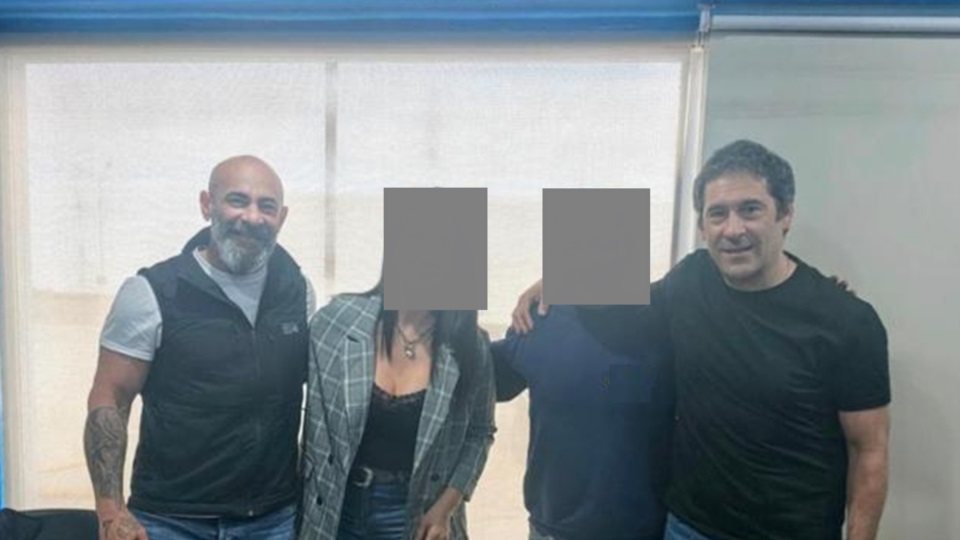 Massoni y Luque, cada uno en una reunión distinta, pero sonrientes para la foto.
