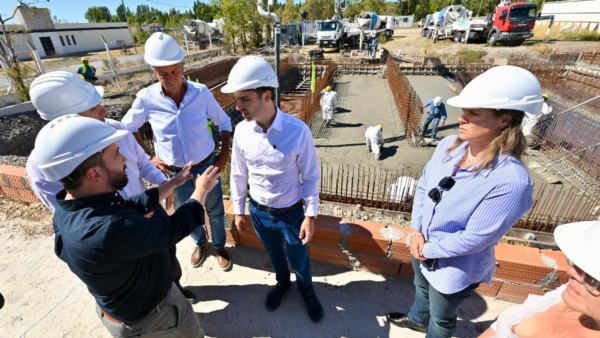 Torres y Menna en la reactivación de la obra.
