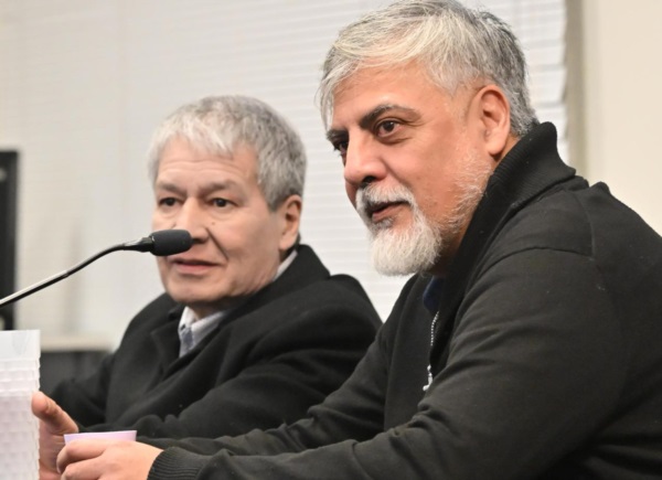 Quiroga (derecha) junto con Romero, su defensor. 