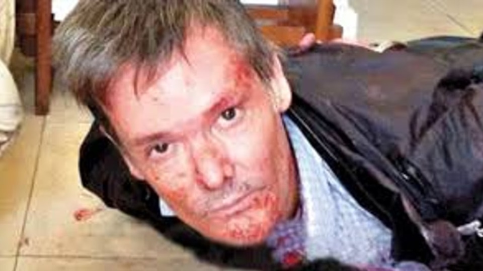 Farré tras ser detenido en la escena del femicidio. Foto: Agencia NA (redes).