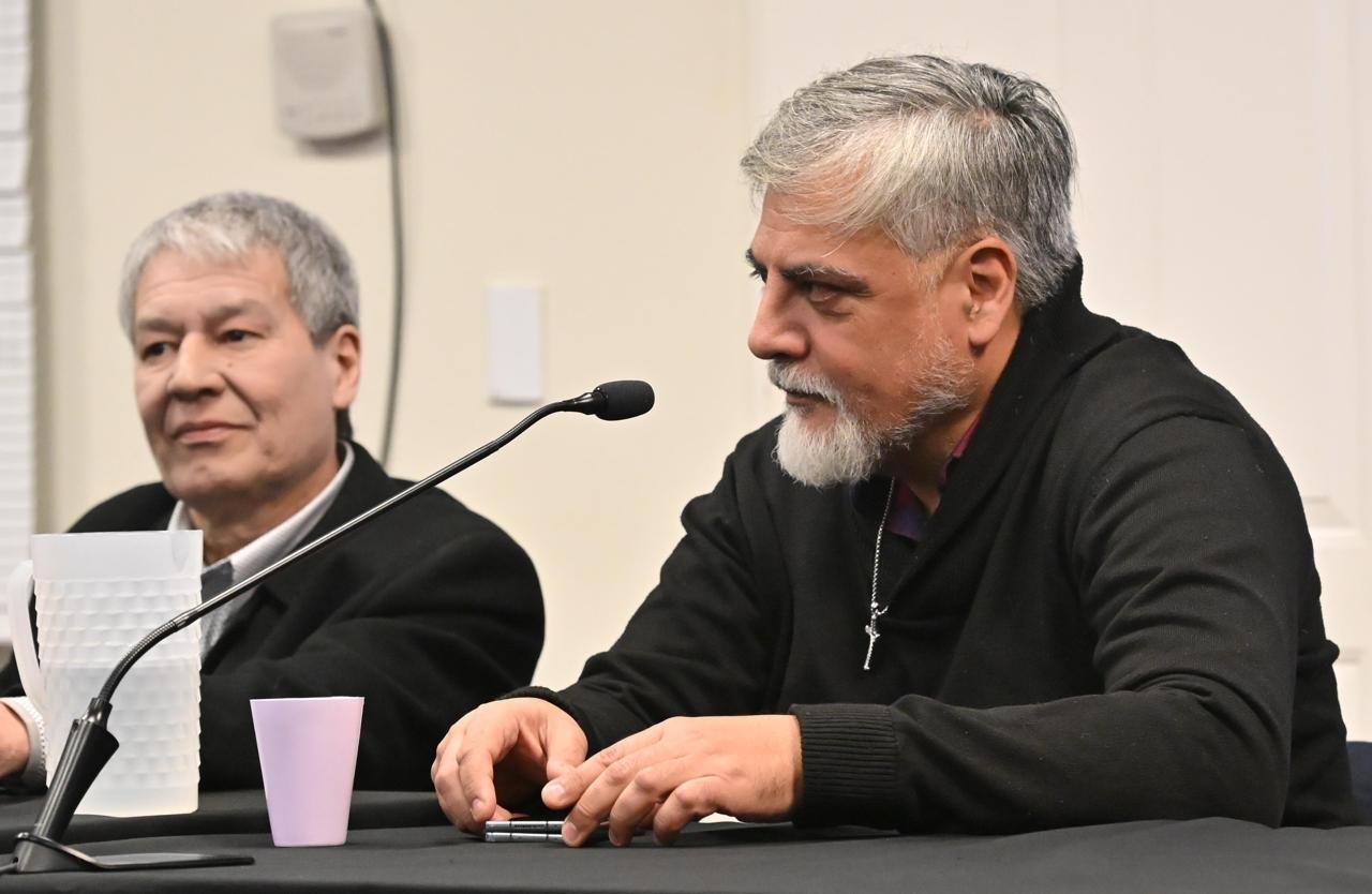 Quiroga (derecha) junto con su defensor Romero. 